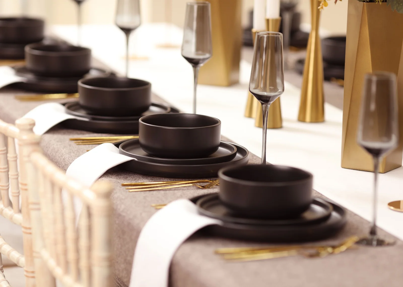 Modern dark brown and gold table setting