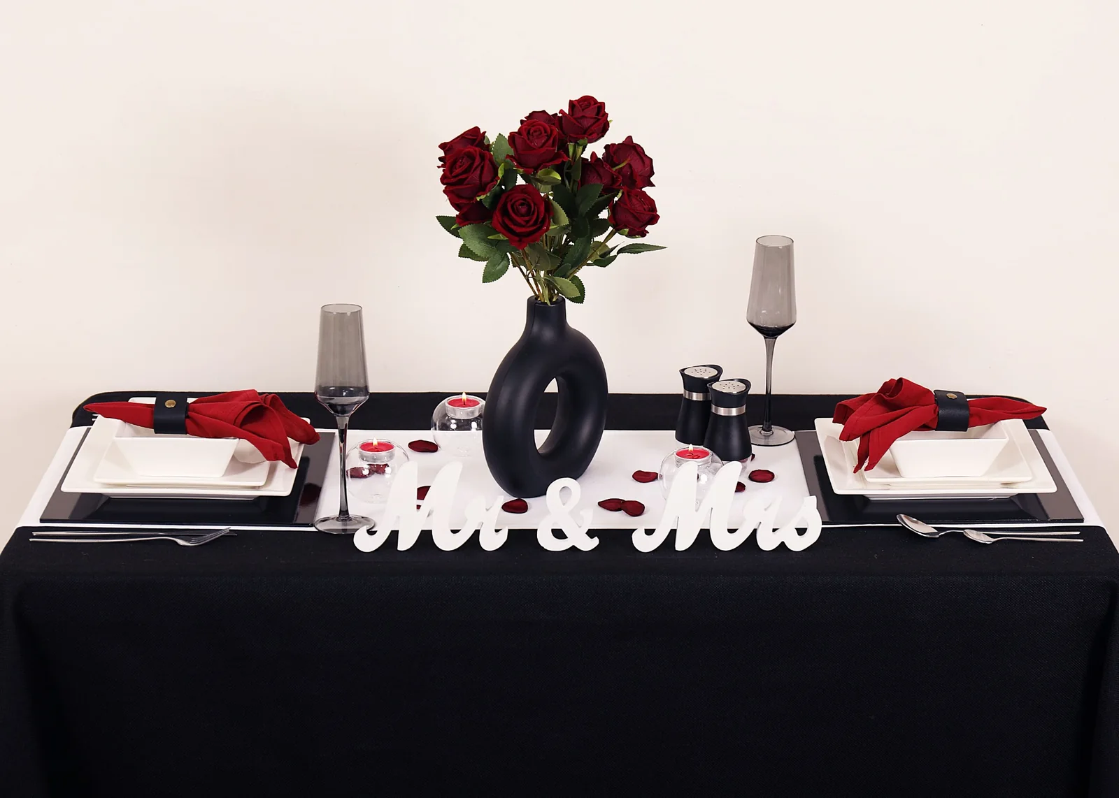 Black, white and red romantic tablescape with roses